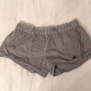 Nike checked shorts.